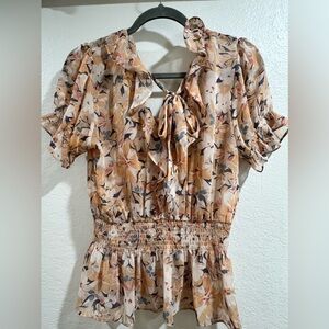 Peach floral short sleeve top with tie in front